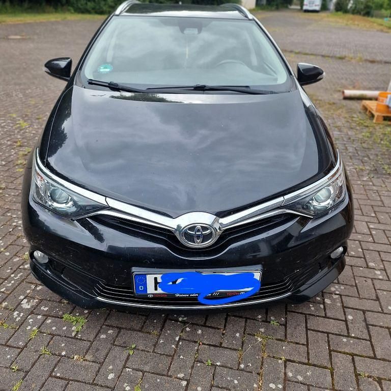 Schwarz Gebraucht 2016 Toyota Auris Touring Sports Kombi | 8.400 € (Fairer Preis) - Bild 1/4