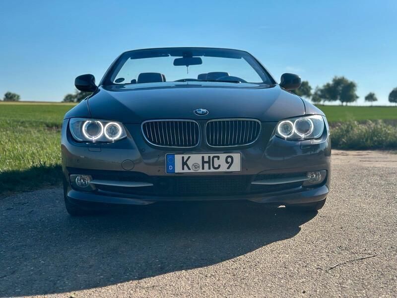 Braun Gebraucht 2011 BMW 330 Cabriolet Performance Cabrio | 12.999 € - Bild 1/4
