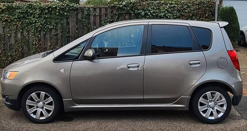 Grau Gebraucht 2010 Mitsubishi Colt Van / Kleinbus | 3.590 € (Guter Preis) - Bild 1/3