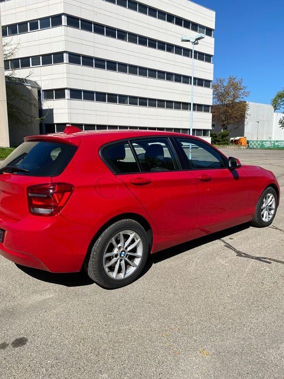 Second-hand BMW 118 143 CP (105 kW) 2012 Roșu Hatchback