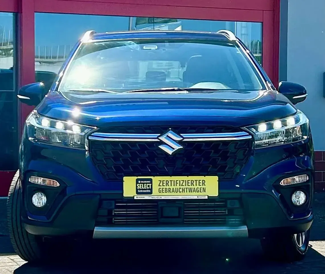 Gebraucht Suzuki SX4 S-Cross Comfort+ 129 PS (94 kW) 2024 Sphere blue pearl metallic SUV
