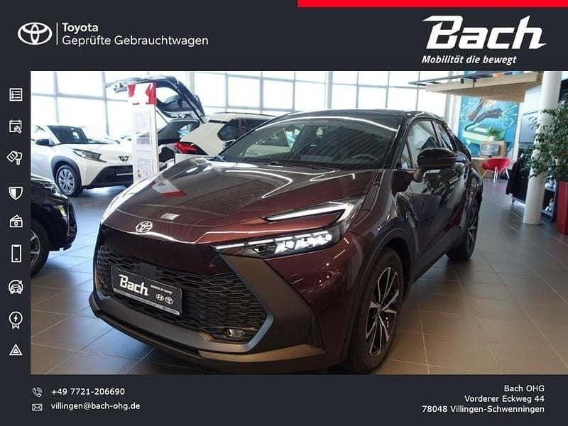 Dunkel amethyst/schwarz Gebraucht 2024 Toyota C-HR Team SUV | 33.480 € (Superpreis) - Bild 1/4