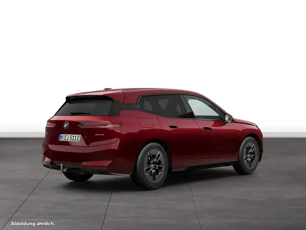 Gebraucht BMW iX 300 kW (408 PS) 2025 Aventurinrot metallic SUV