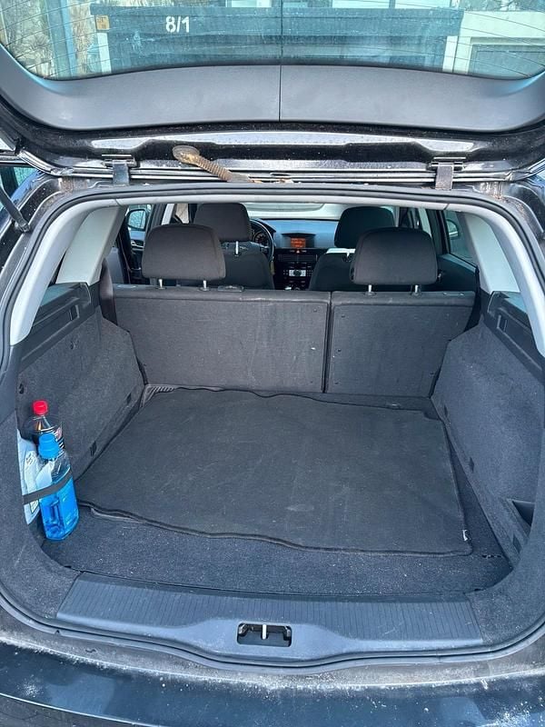 Gebraucht Opel Astra 116 PS (85 kW) 2010 Schwarz Kombi