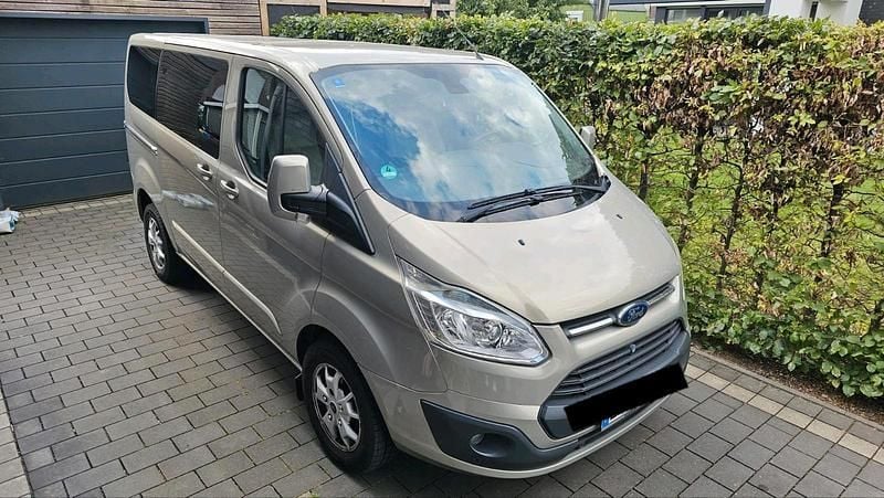 Gold Gebraucht 2012 Ford Tourneo Custom Van / Kleinbus | 12.500 € - Bild 1/4