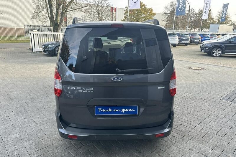 Gebraucht Ford Tourneo Courier 101 PS (74 kW) 2015 Grau (magneticgrau) Van / Kleinbus