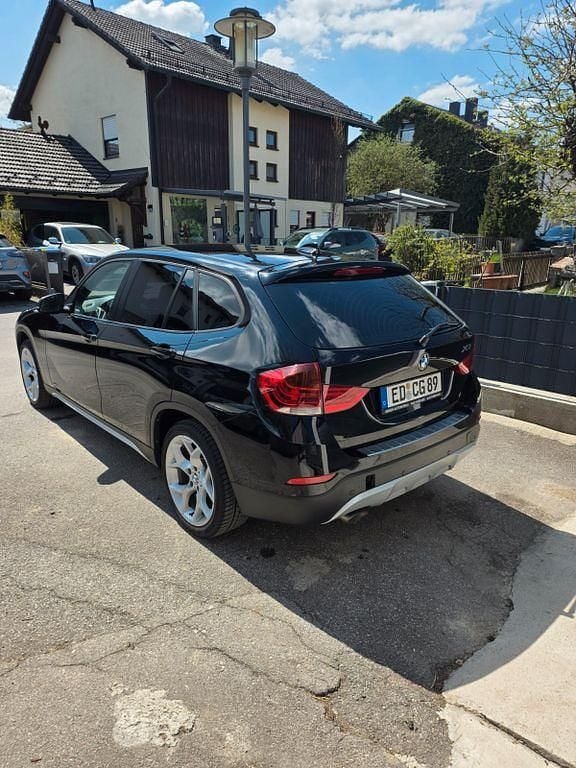 Second-hand BMW X1 116 CP (85 kW) 2012 Negru SUV