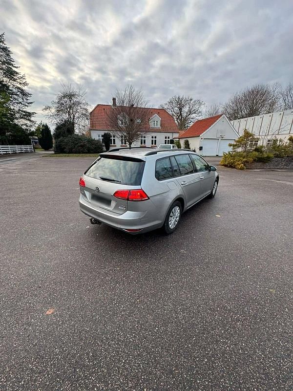 Second-hand VW Golf VII 105 CP (77 kW) 2014 Argintiu Break