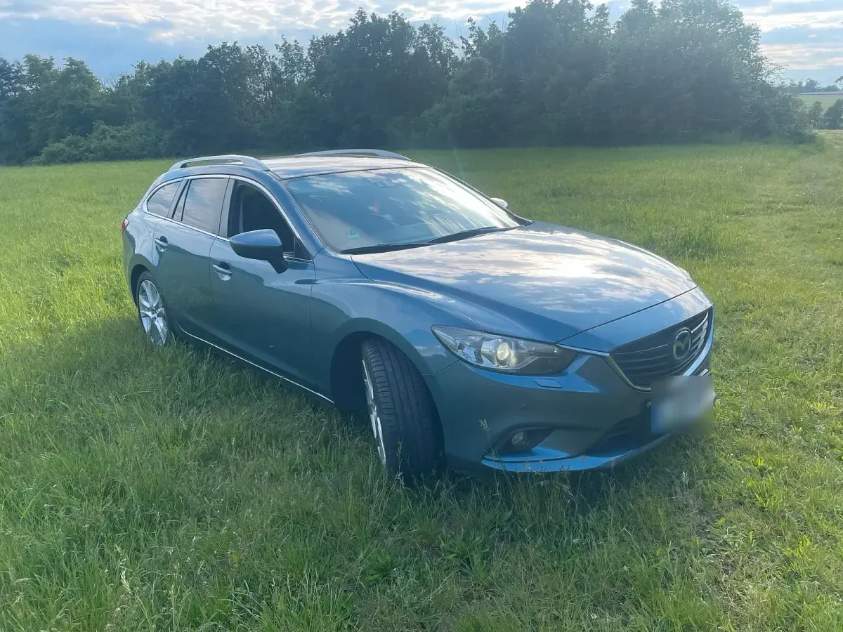 Używany Mazda 6 175 KM (128 kW) 2013 Niebieski Kombi