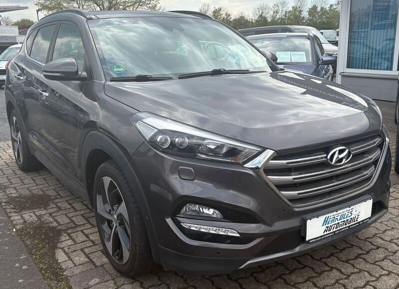 Braun Gebraucht 2016 Hyundai Tucson Premium SUV | 14.990 € (Fairer Preis) - Bild 1/4