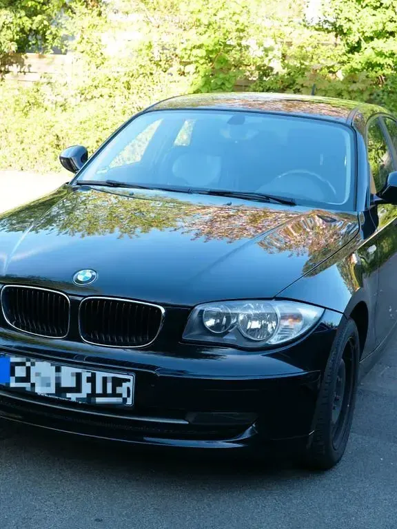 Second-hand BMW 116 122 CP (89 kW) 2009 Negru Hatchback