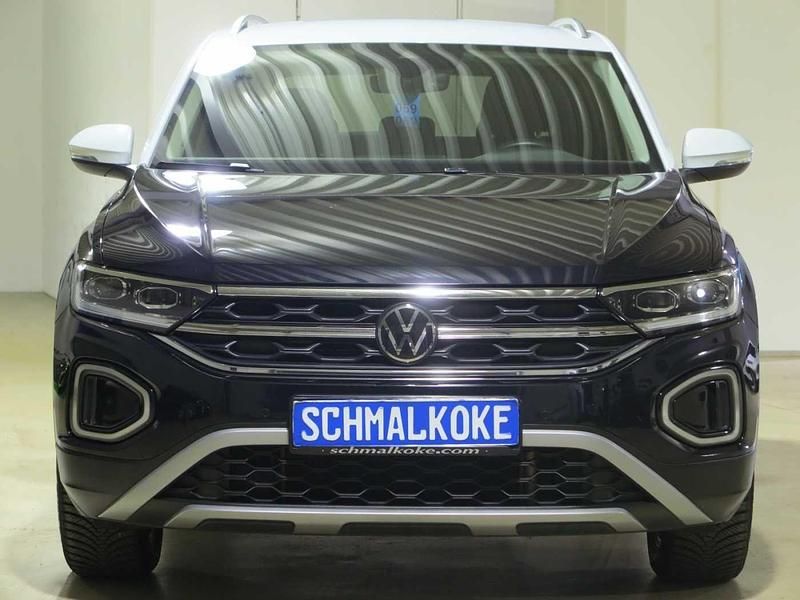 Deep black pearlescent (metallic) Gebraucht 2024 VW T-Roc Style SUV | 25.500 € (Superpreis) - Bild 1/4