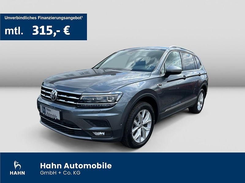Grau Gebraucht 2021 VW Tiguan Allspace Highline SUV | 31.790 € (Fairer Preis) - Bild 1/3