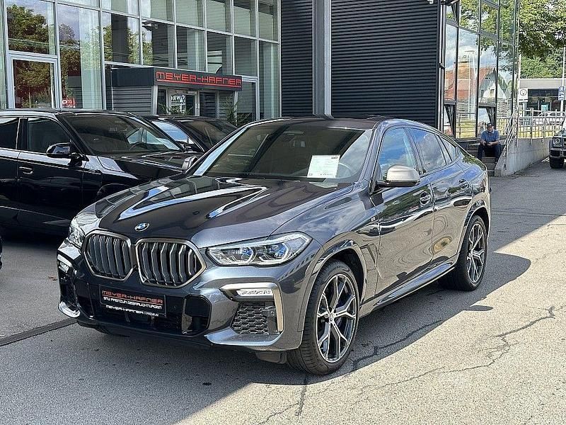 Grau Gebraucht 2021 BMW X6 M50 Sport Line SUV | 67.990 € (Teuer) - Bild 1/4
