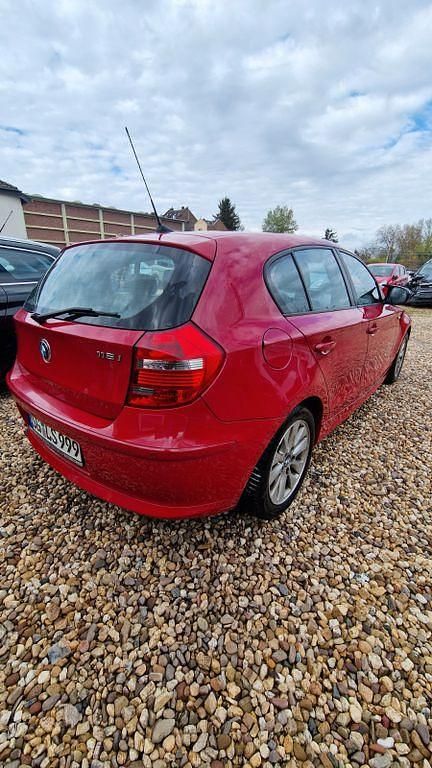 Gebraucht BMW 116 Advantage 122 PS (89 kW) 2011 Rot Kleinwagen