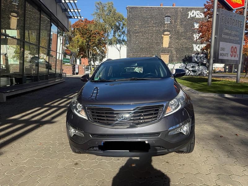 Grau Gebraucht 2012 Kia Sportage SUV | 10.499 € (Superpreis) - Bild 1/4