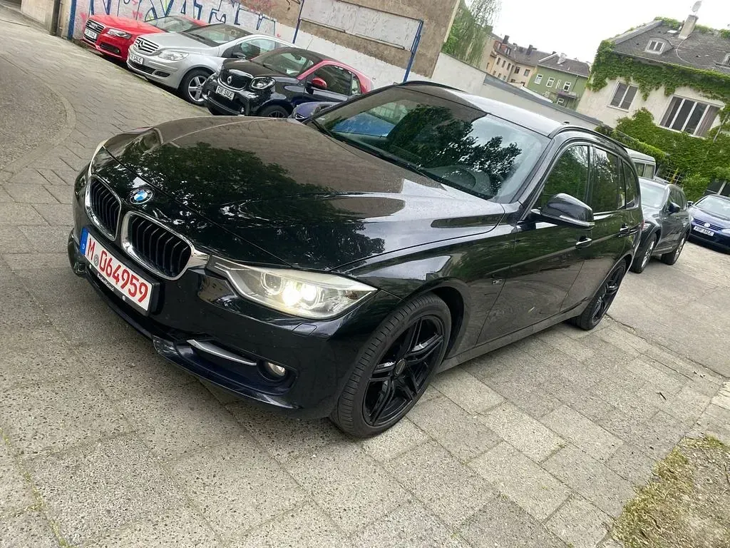 Gebraucht BMW 316 Sport Line 136 PS (100 kW) 2013 Schwarz Kombi