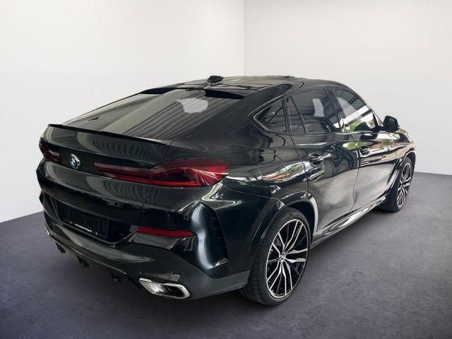 Black sapphire black sapphire Gebraucht 2024 BMW X6 M Sport SUV | 102.339 € (Fairer Preis) - Bild 1/4