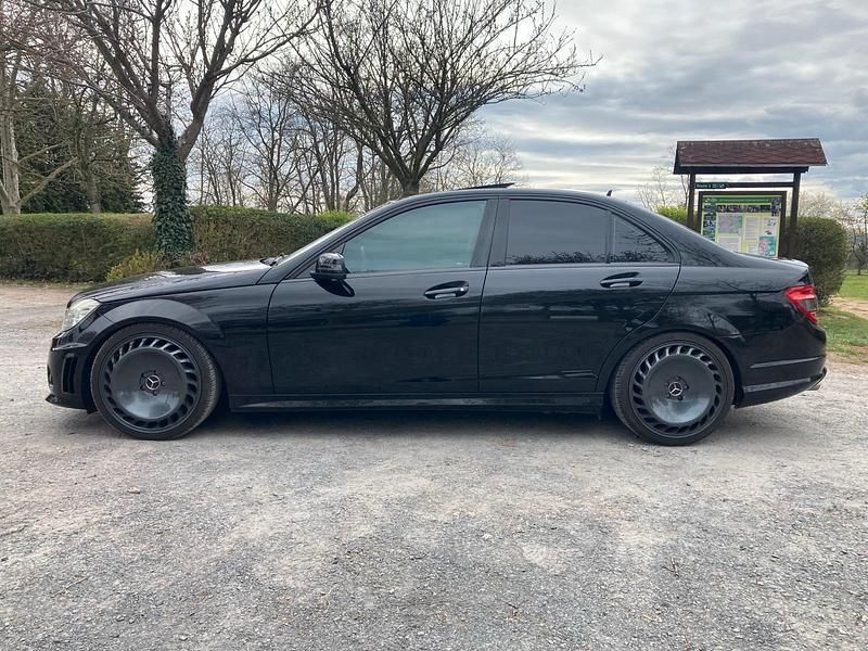 Schwarz Gebraucht 2008 Mercedes C63 AMG Avantgarde Limousine | 9.999 € - Bild 1/4