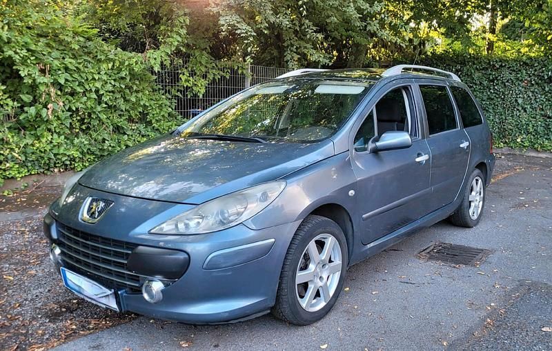 Grau Gebraucht 2007 Peugeot 307 Kombi | 1.400 € (Fairer Preis) - Bild 1/4