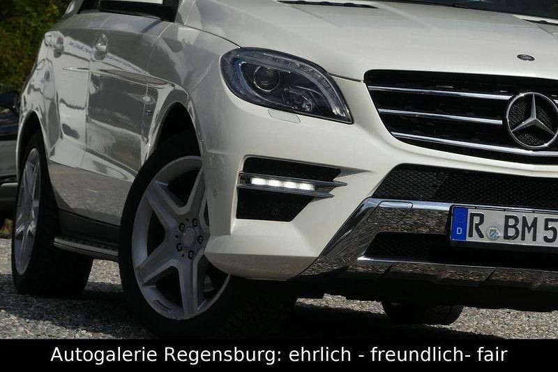 Designo diamantweiß Gebraucht 2012 Mercedes ML350 AMG line SUV | 21.950 € (Fairer Preis) - Bild 1/4