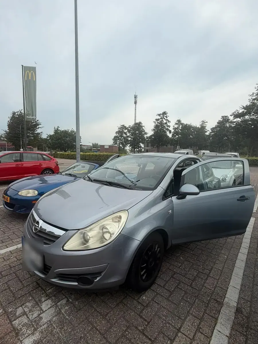Gebraucht Opel Corsa 60 PS (44 kW) 2009 Grau Kleinwagen