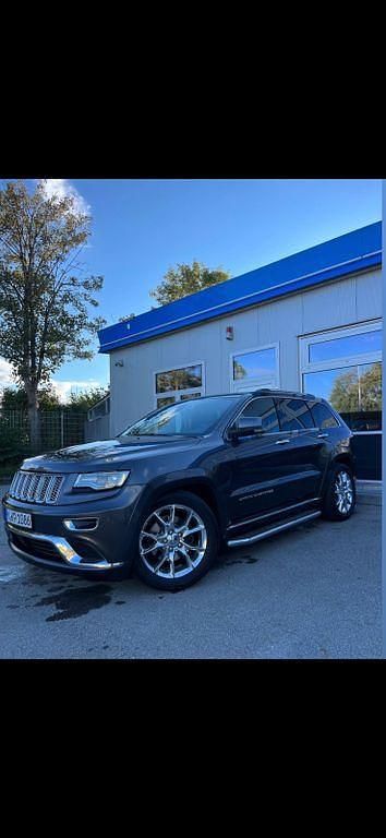 Grau Gebraucht 2015 Jeep Grand Cherokee Summit SUV | 18.200 € (Fairer Preis) - Bild 1/4