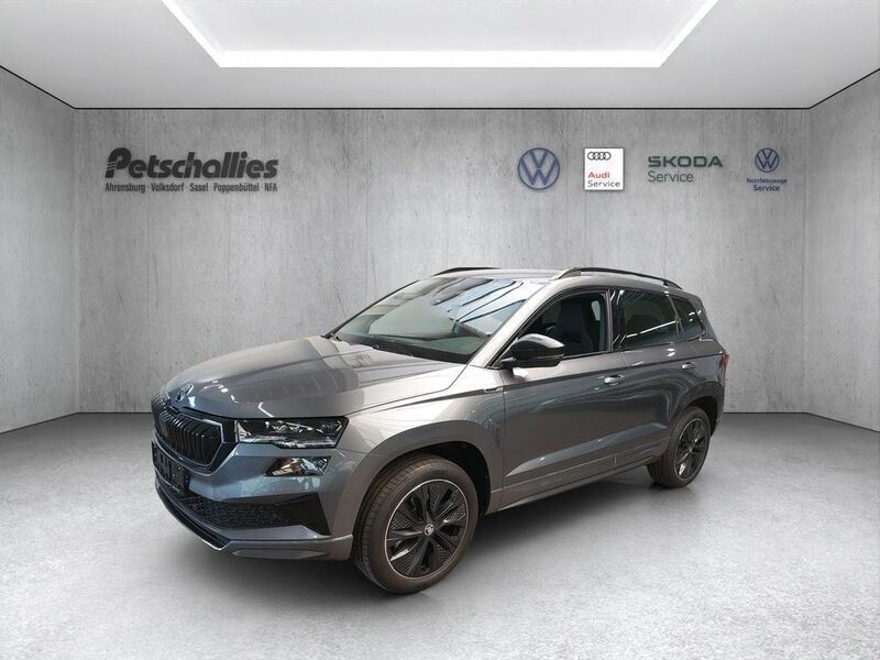 Grau Gebraucht 2023 Skoda Karoq SportLine SUV | 34.990 € (Etwas zu teuer) - Bild 1/4