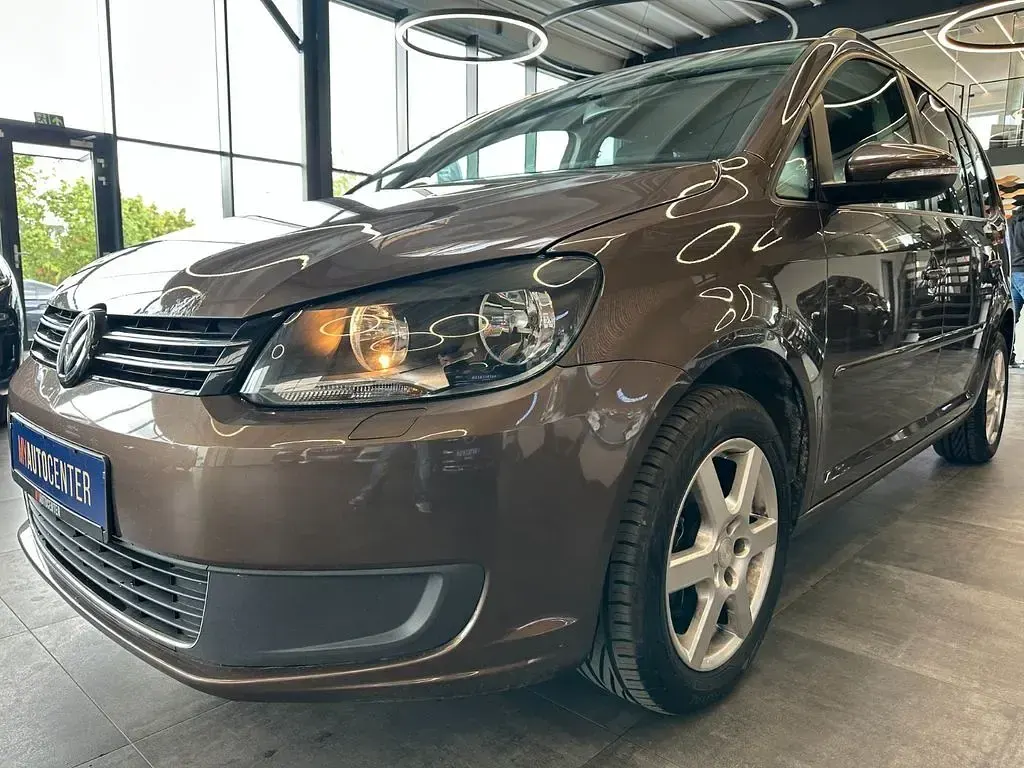 Używany VW Touran 105 KM (77 kW) 2012 Brązowy Minivan