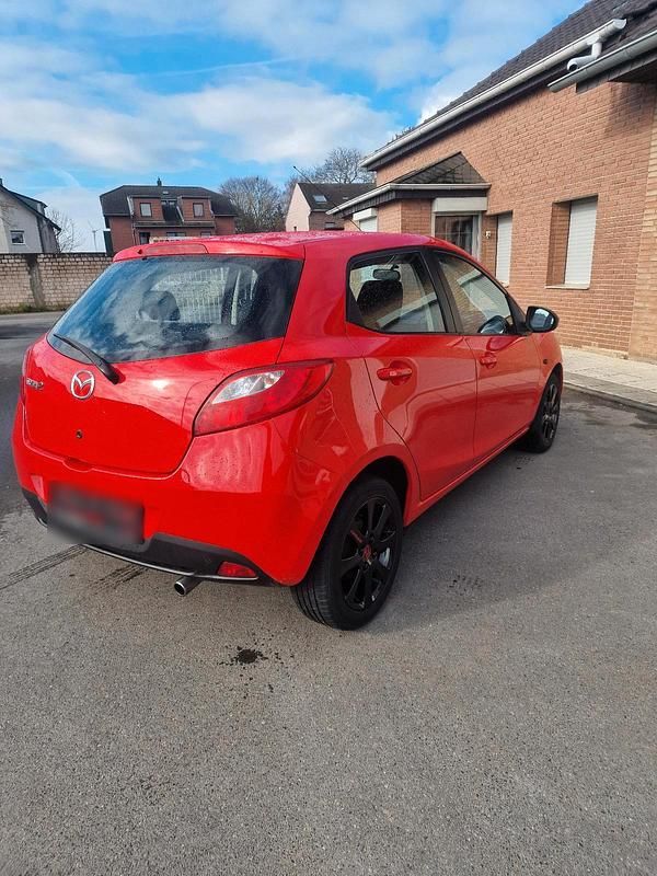 Gebraucht Mazda 2 75 PS (55 kW) 2009 Rot Kleinwagen