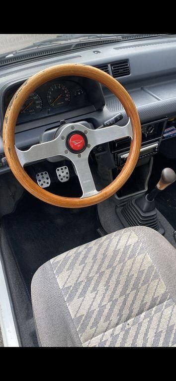 Gebraucht Daihatsu Cuore 41 PS (30 kW) 1989 Weiß Kleinwagen