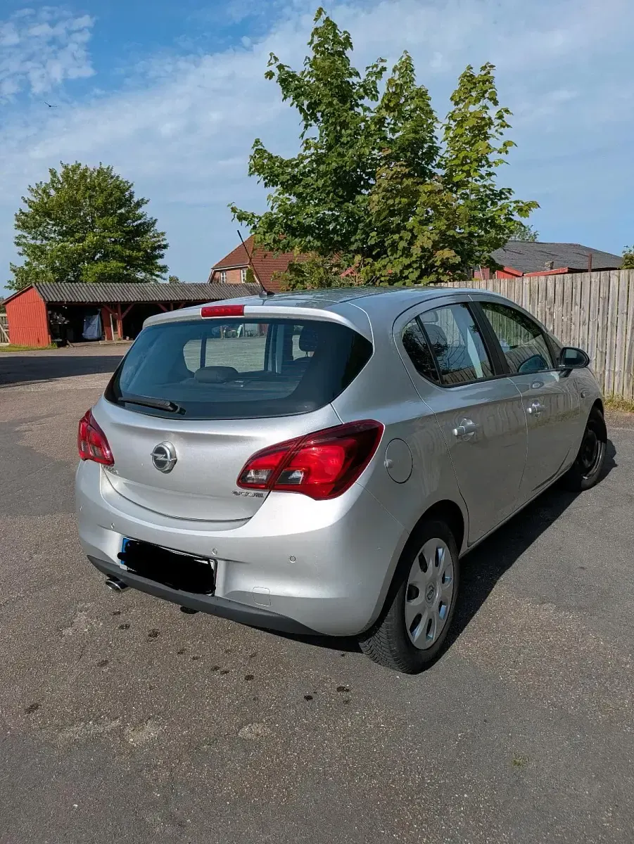 Używany Opel Corsa 95 KM (69 kW) 2016 Srebrny Hatchback