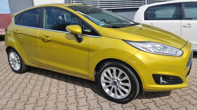 Gold (metallic) Gebraucht 2013 Ford Fiesta Individual Kleinwagen | 7.998 € (Fairer Preis) - Bild 1/4