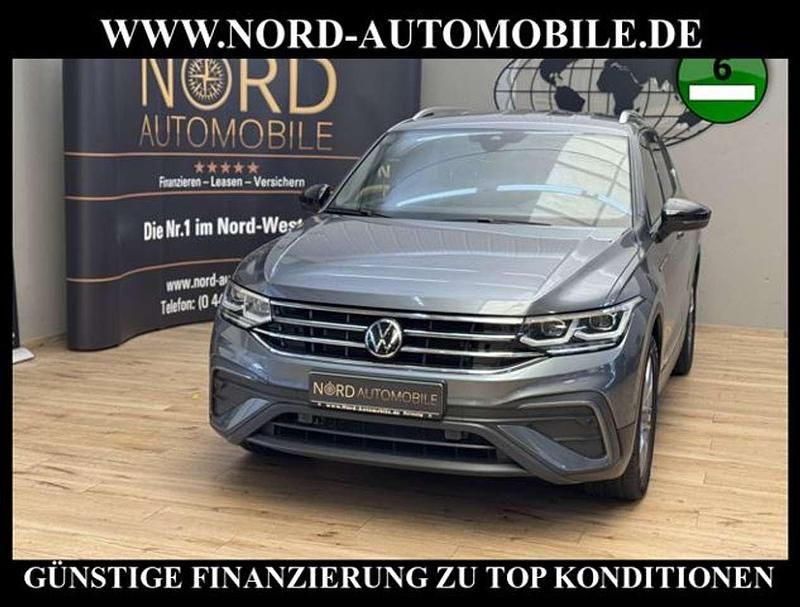 Platinum grey metallic (metallic) Gebraucht 2023 VW Tiguan Allspace Move SUV | 32.900 € (Guter Preis) - Bild 1/3