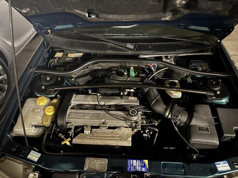 Gebraucht Ford Escort Cabriolet Ghia 90 PS (66 kW) 1997 Grün Cabrio