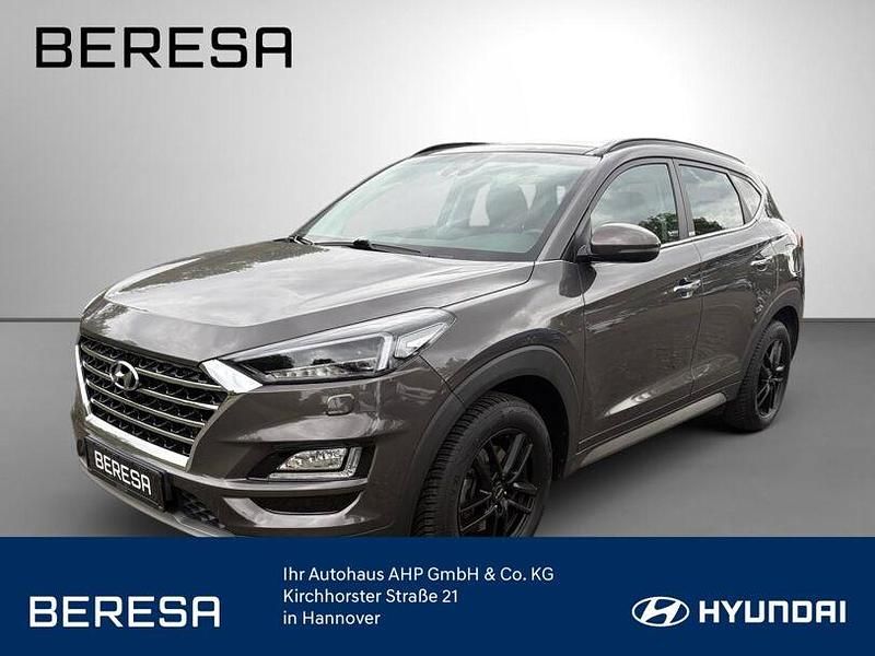 Grau Gebraucht 2020 Hyundai Tucson Premium SUV | 21.480 € (Fairer Preis) - Bild 1/4