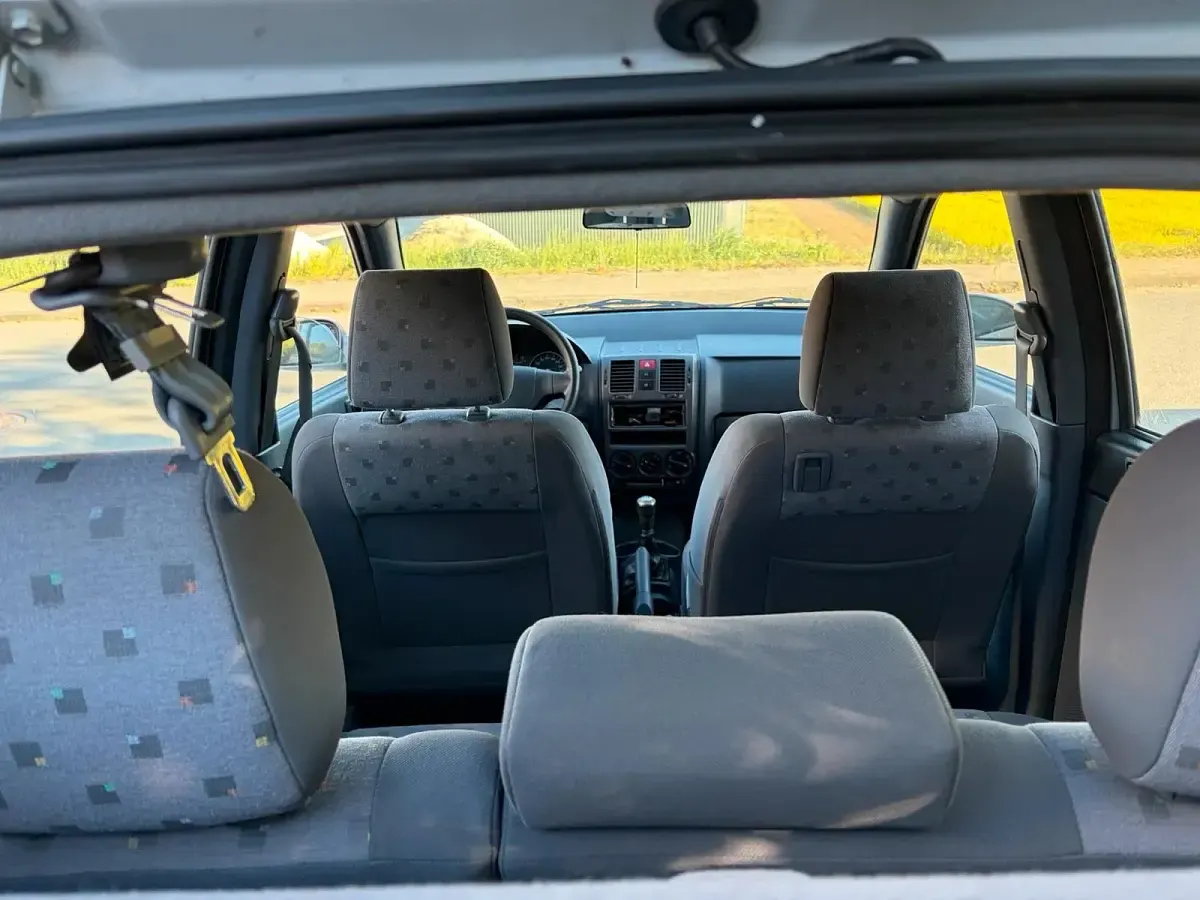 Second-hand Hyundai Getz 60 CP (44 kW) 2004 Argintiu Hatchback