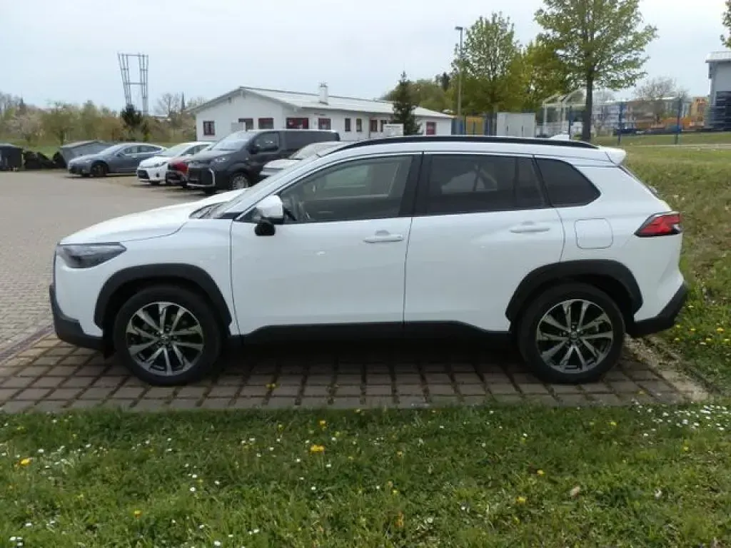 Gebraucht Toyota Corolla Hybrid Team 196 PS (144 kW) 2022 Super (pure) white ii SUV