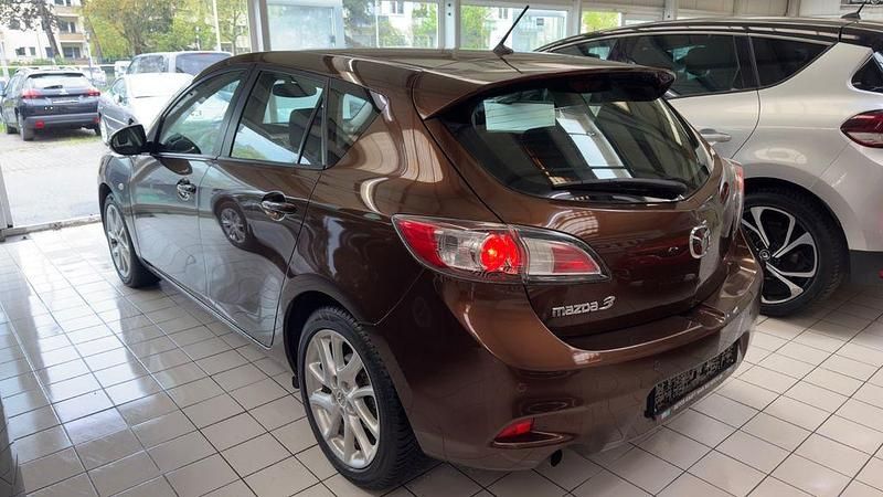 Używany Mazda 3 Edition 105 KM (77 kW) 2012 Brązowy Sedan/Limuzyna