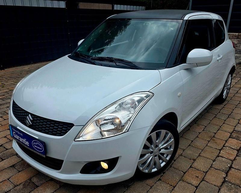 Weiß Gebraucht 2011 Suzuki Swift Kleinwagen | 3.799 € (Fairer Preis) - Bild 1/4