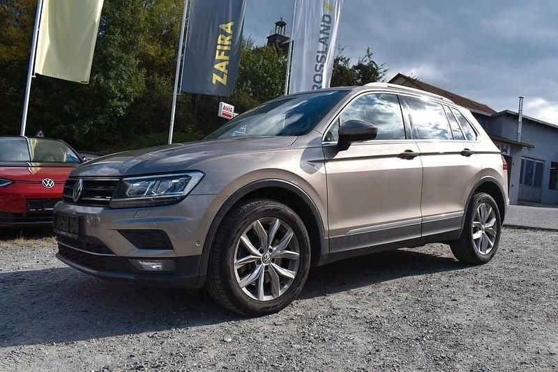 Titanium beige (metallic) Gebraucht 2019 VW Tiguan Highline SUV | 23.950 € (Fairer Preis) - Bild 1/4