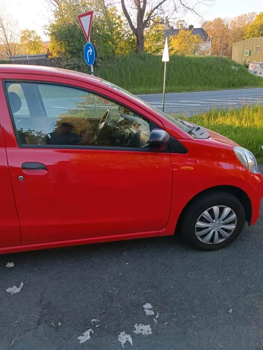 Gebraucht Daihatsu Cuore 70 PS (51 kW) 2008 Rot Kleinwagen