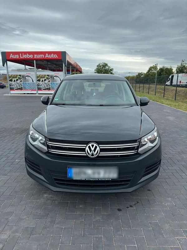 Grau Gebraucht 2014 VW Tiguan SUV | 8.999 € (Fairer Preis) - Bild 1/4