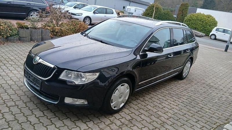 Używany Skoda Superb Elegance 140 KM (102 kW) 2013 Czarny Kombi