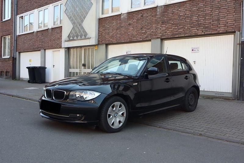 Gebraucht BMW 116 122 PS (89 kW) 2010 Schwarz Kleinwagen