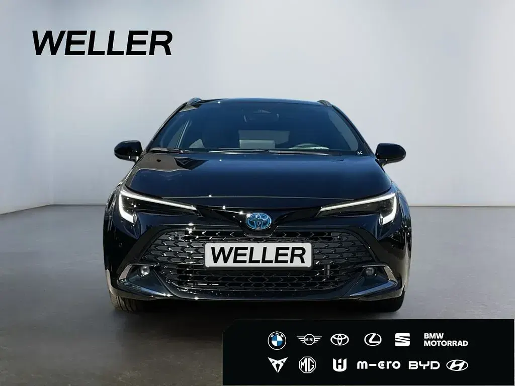 Neu Toyota Corolla Hybrid 196 PS (144 kW) 2026 Karminarot met. sonderfarbe Kombi