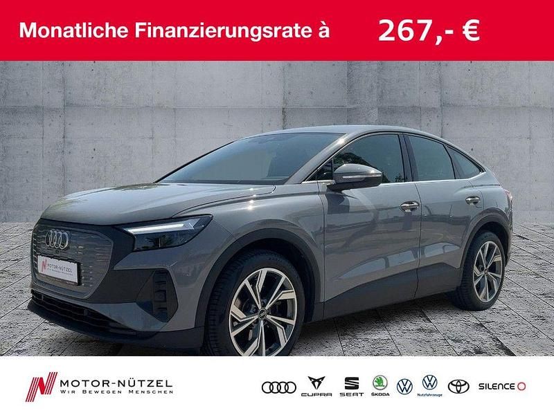 Grau Gebraucht 2022 Audi Q4 Sportback e-tron Sport SUV | 23.950 € (Fairer Preis) - Bild 1/4
