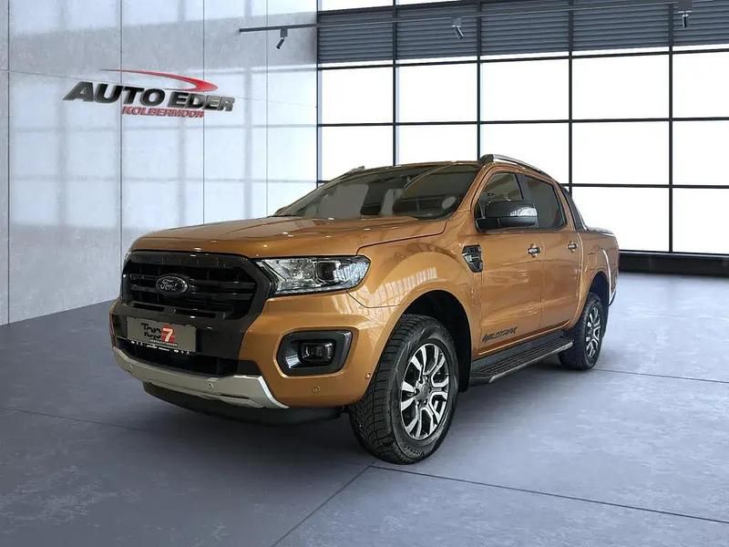 Canyonorange (orange) Gebraucht 2021 Ford Ranger Wildtrack Abholung | 35.990 € (Fairer Preis) - Bild 1/4