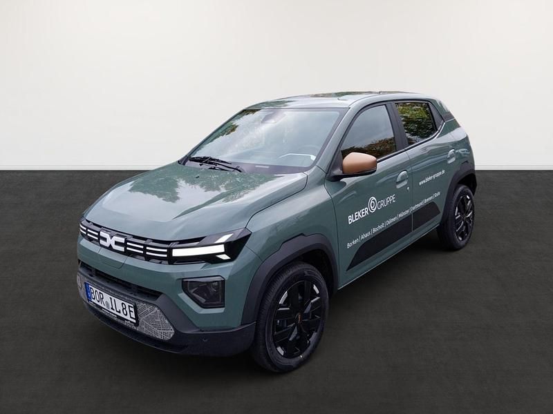 Oliv grau Gebraucht 2024 Dacia Spring Extreme Kleinwagen | 15.890 € (Superpreis) - Bild 1/4