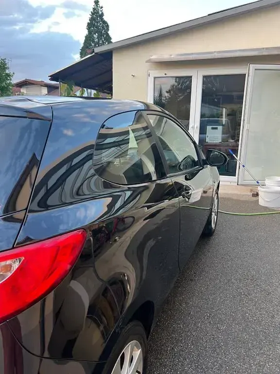Gebraucht Mazda 2 75 PS (55 kW) 2010 Schwarz Kleinwagen